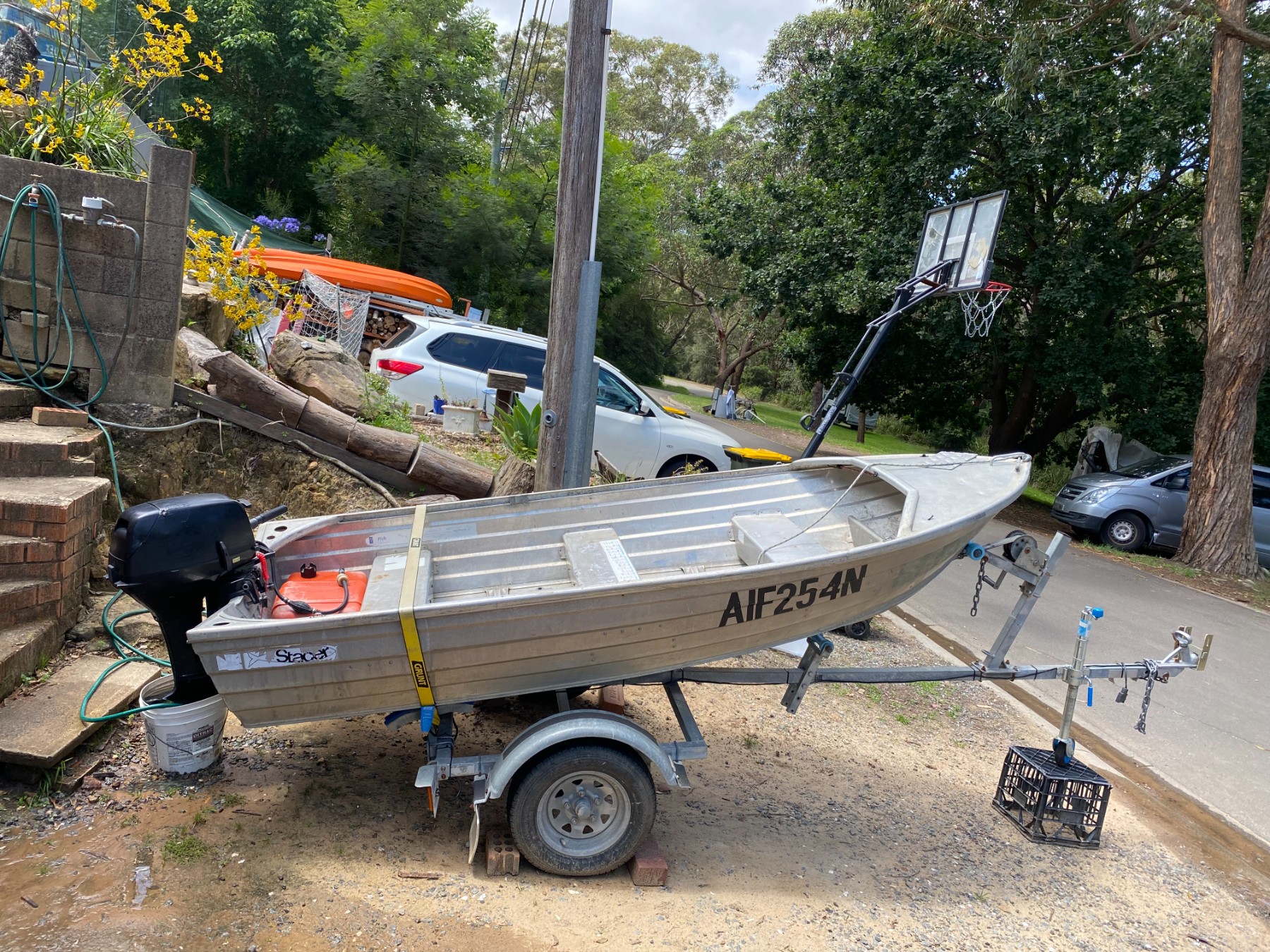 Aluminium tinnie (small row/jet boat) with trailer + outboard — pickup Pakenham